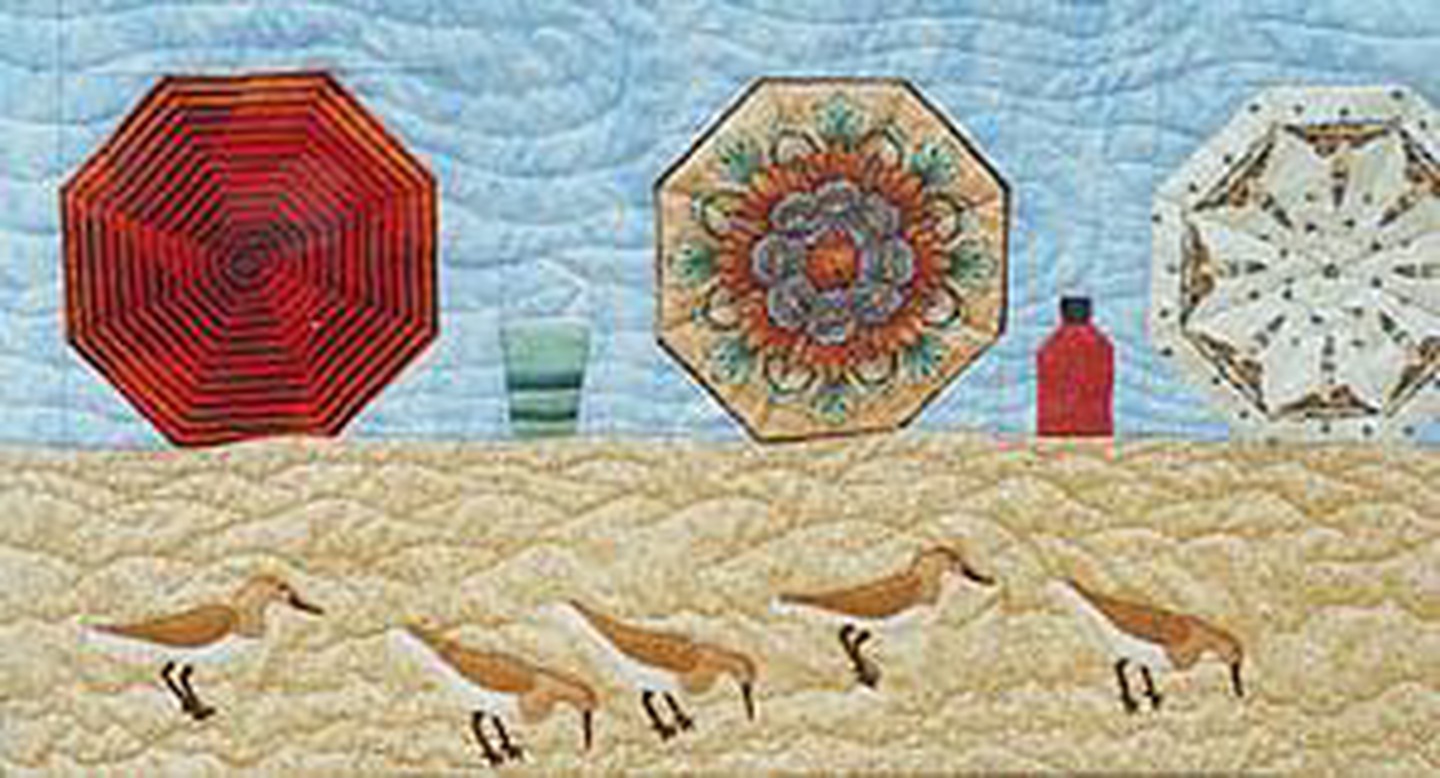 Tide's Out: Beach scene with umbrellas, drink, sunscreen and sandpipers. Note the lighthouse fabric in the right umbrella! Tide's Out: Beach scene with umbrellas, drink, sunscreen and sandpipers. Note the lighthouse fabric in the right umbrella!